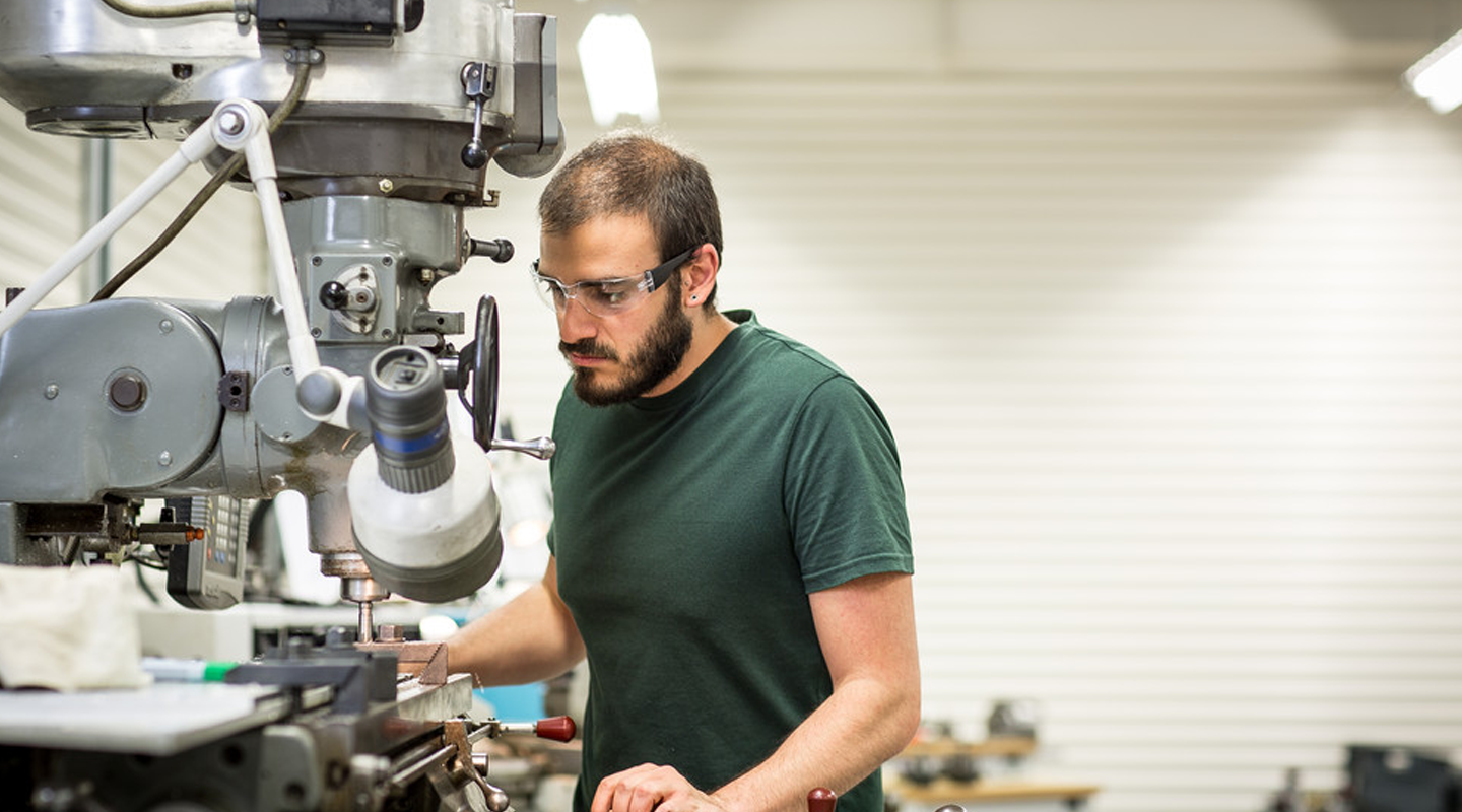 A student working in the engineering labs of The School of Science and Technology.